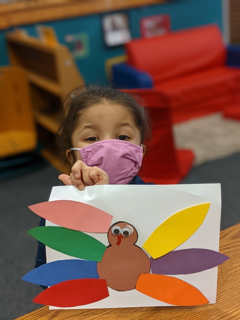 Preschool Child showing her finished turkey