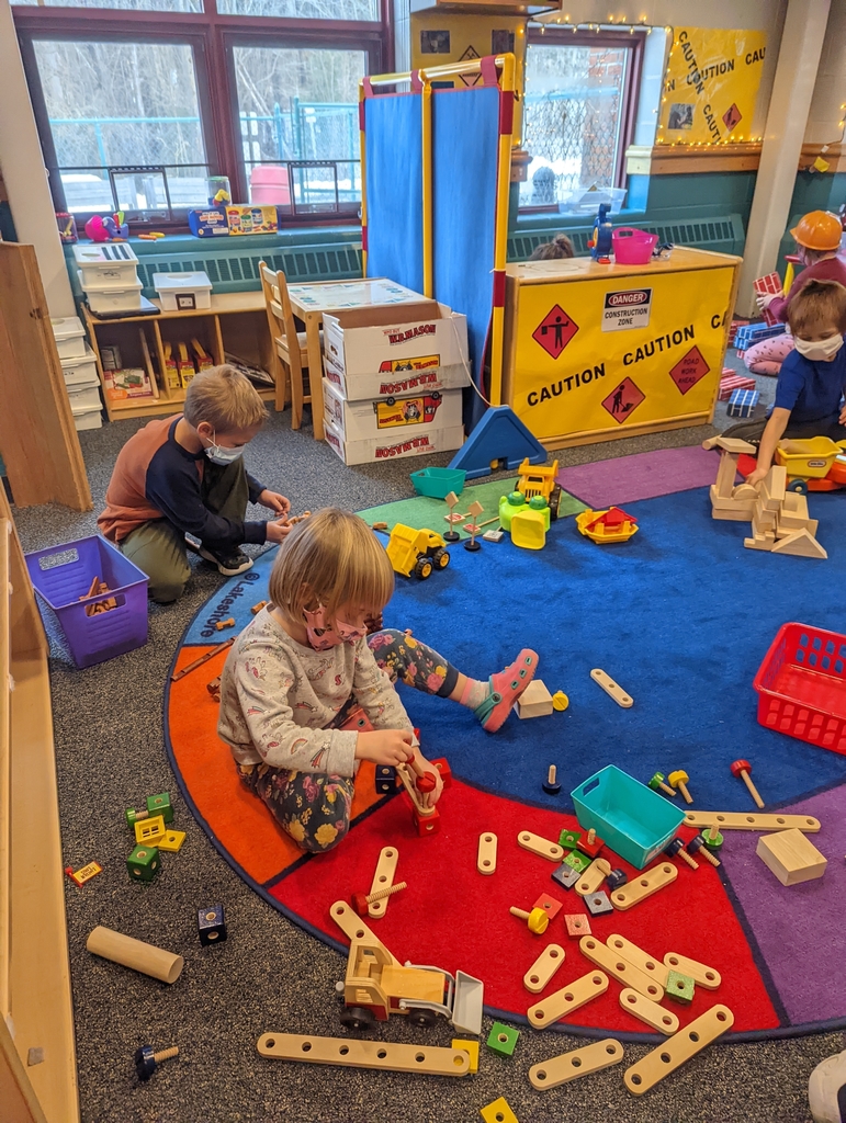children building in classroom